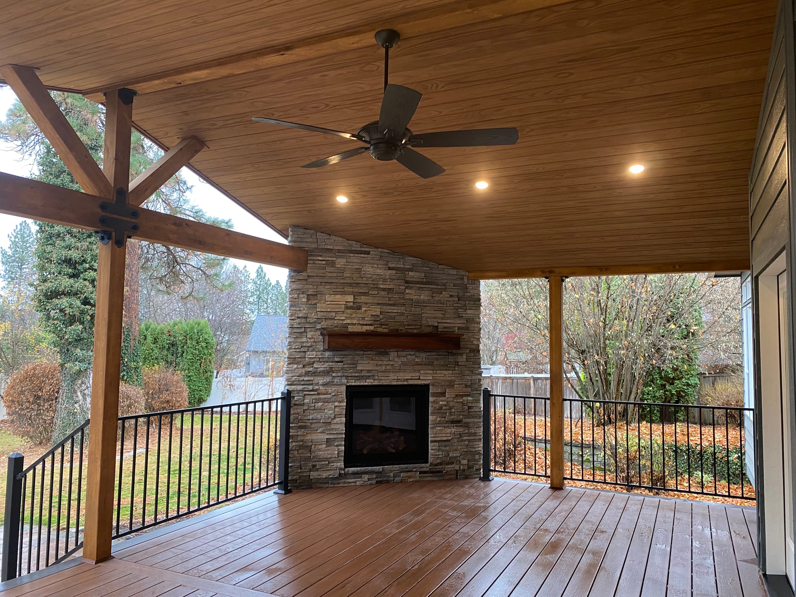 Covered deck with ceiling fan, timber king-post truss