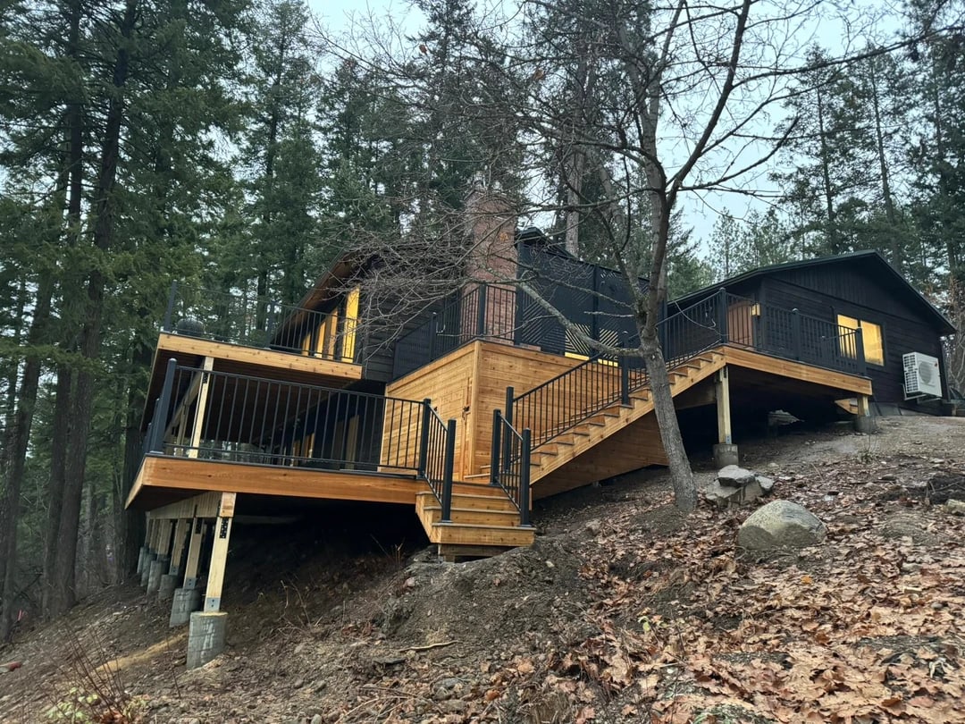 PVC decking, cedar fascia, black metal railing, aluminum railing, privacy panels, privacy wall for deck, large deck